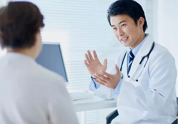 CureRays physician discussing radiation medicine with a patient in a primary care office