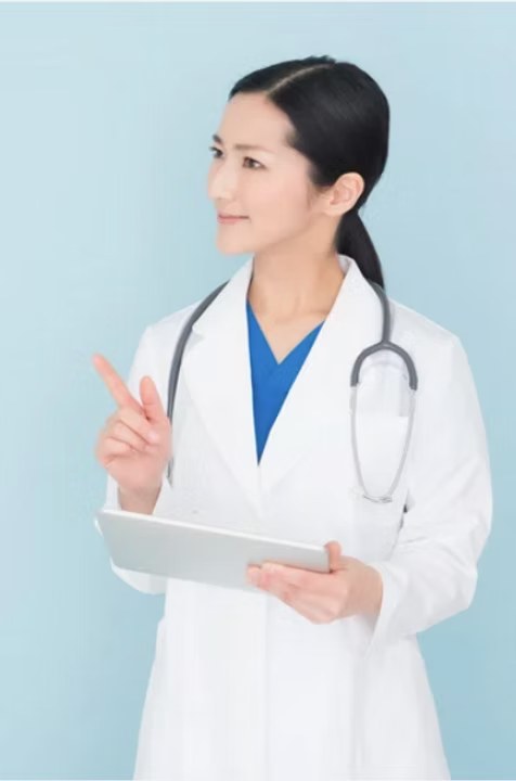 Clinician reviewing an image-guided superficial radiation therapy plan on a tablet