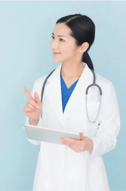 Clinician reviewing an image-guided superficial radiation therapy plan on a tablet